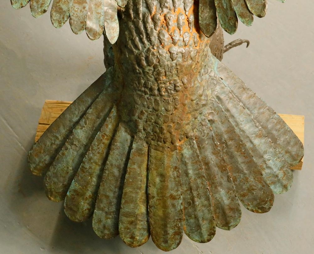 Artwork by Gordon Brott, American Eagle Attacking, Made of cast bronze with applied patinated copper wing feathers