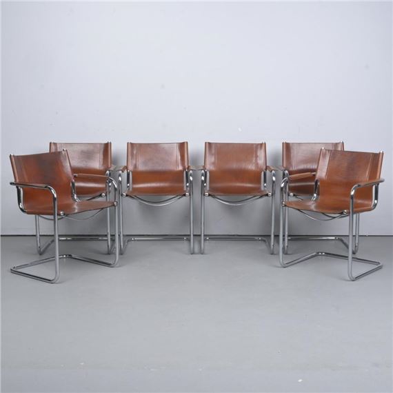 A SET OF SIX MART STAM CHROME AND TAN LEATHER CANTILEVERED ARMCHAIRS - Mart Stam