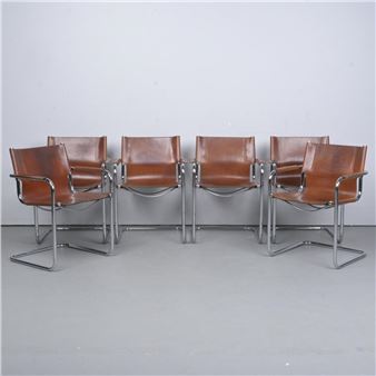 A SET OF SIX MART STAM CHROME AND TAN LEATHER CANTILEVERED ARMCHAIRS - Mart Stam