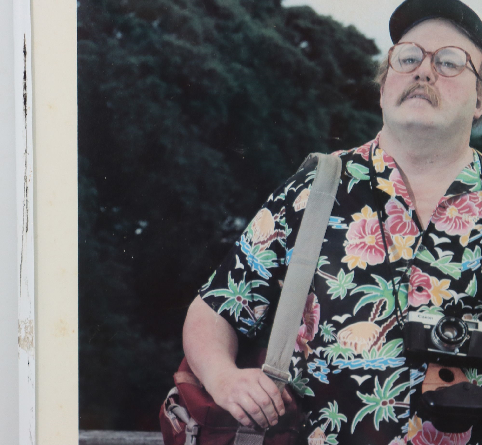 Artwork by Duane Hanson, Two of the artist's stunningly lifelike figures as bored tourists in a tropical paradise, Made of Poster