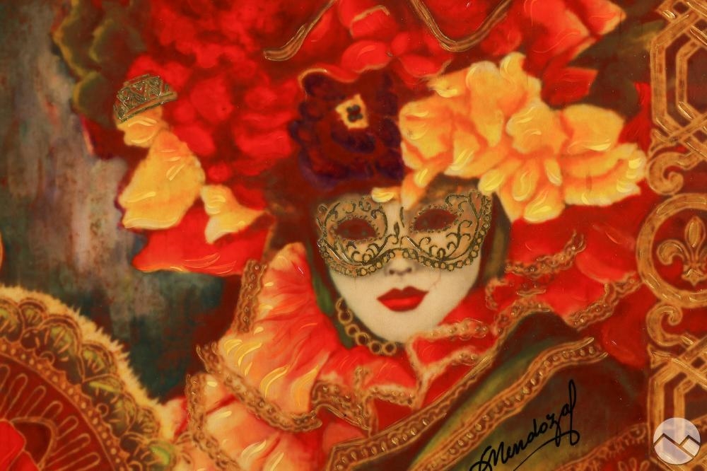 A masked figure in a richly ornate frame adorned with floral and geometric patterns.