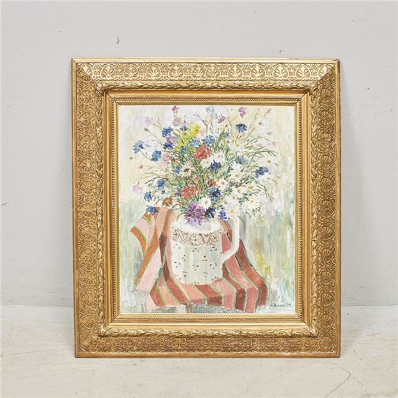 A floral still life in a striped chair within an ornate frame.