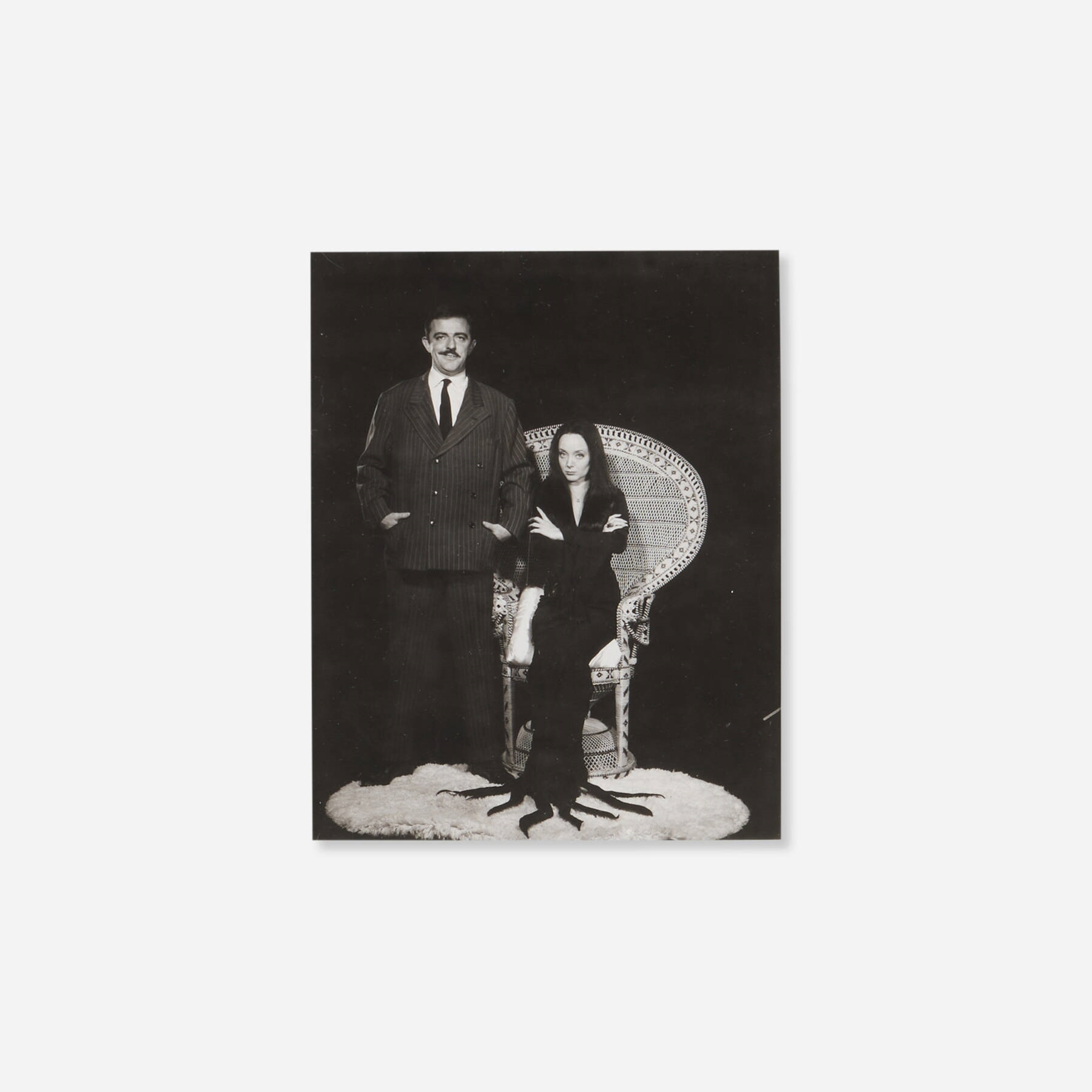 Philippe Halsman | Morticia and Gomez Addams (1964) | MutualArt