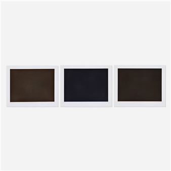 three polaroids on a white background with a black background