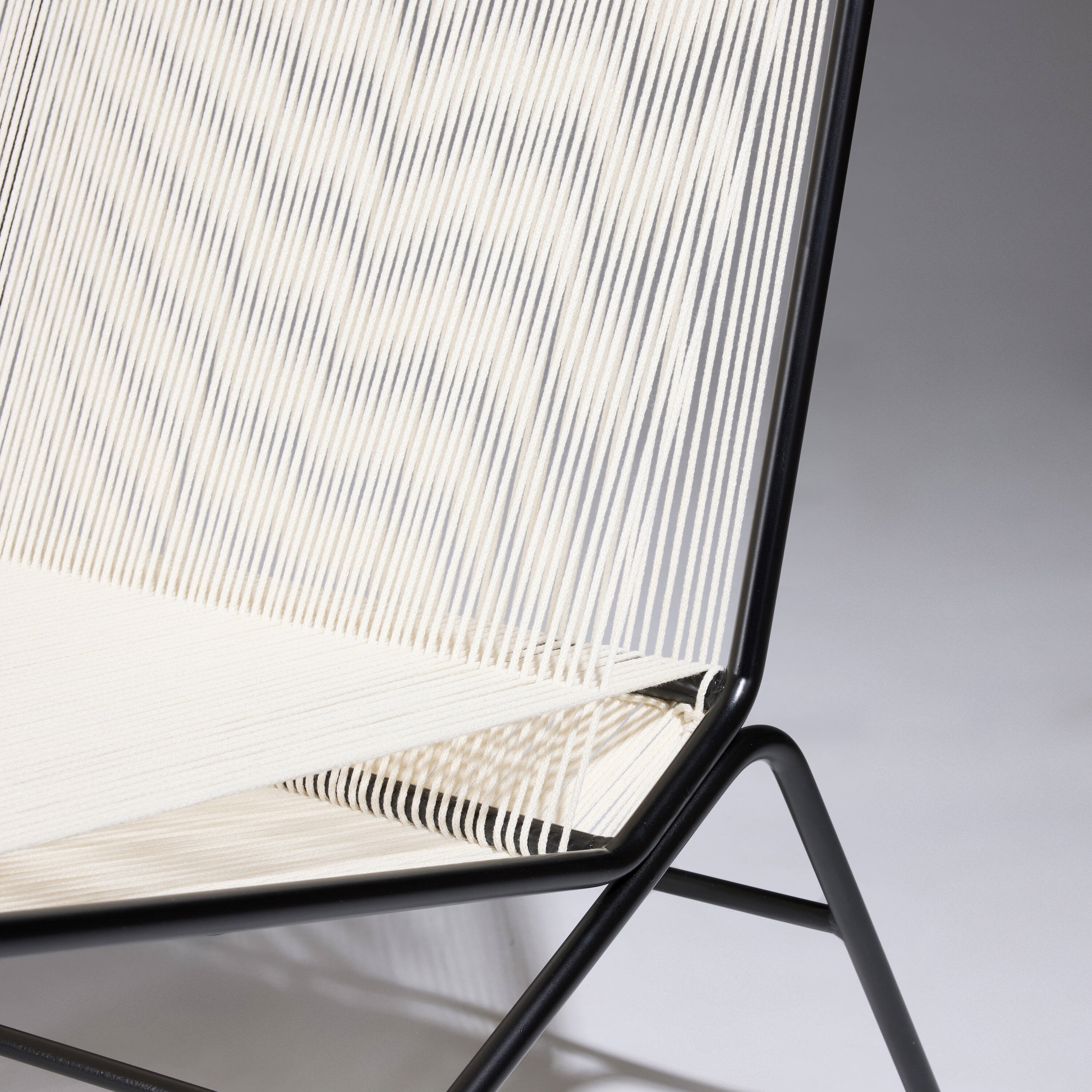 Artwork by Allan Gould, Lounge chair, Made of lacquered steel, cotton cord