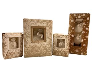 White Bisque Angels - Margaret Furlong