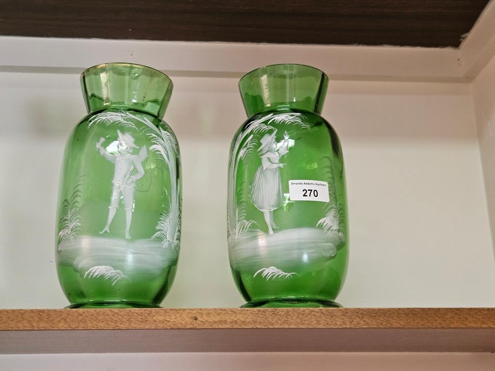 Artwork by Mary Gregory, green glass girl and boy painted pair of vases, Made of Green Glass