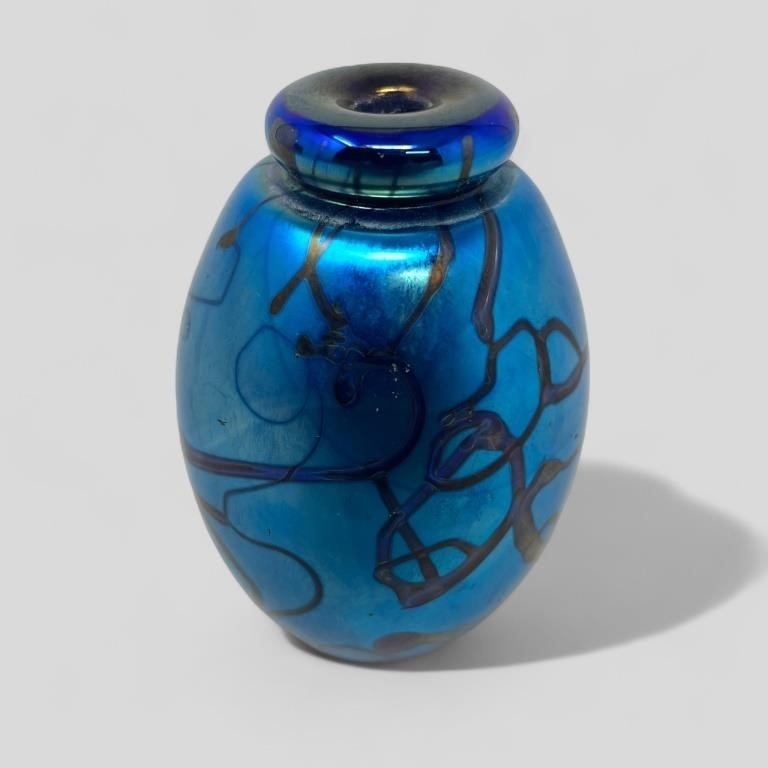Artwork by Eric Eickholt, perfume bottle paperweight, Made of Glass
