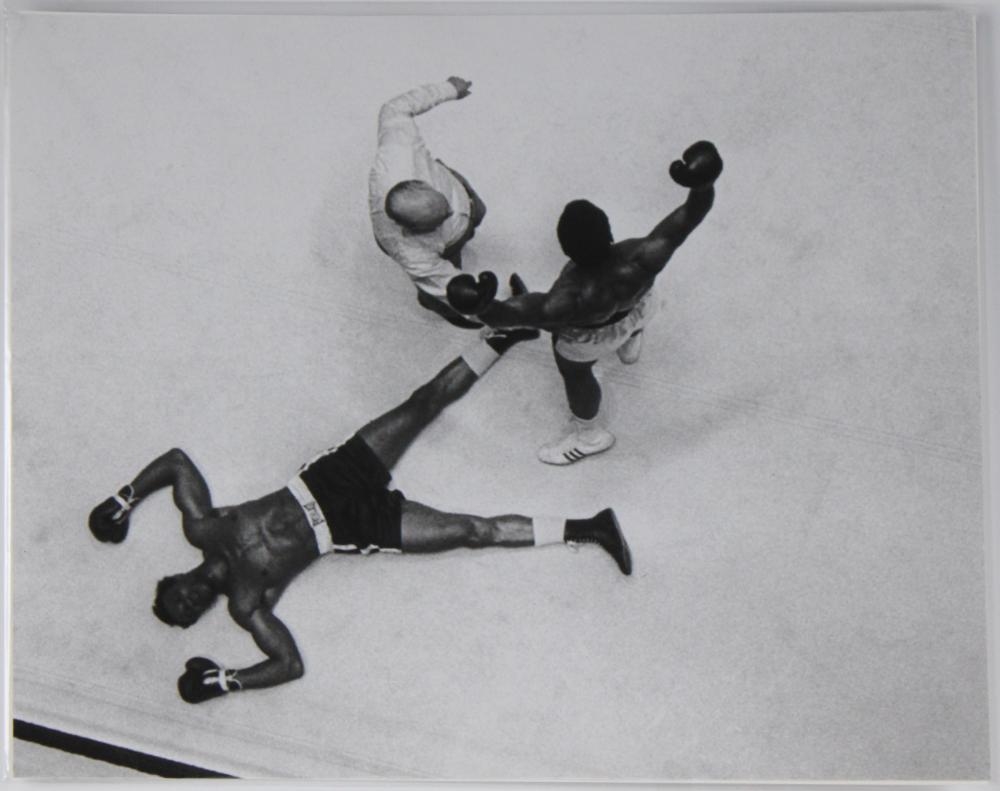 Artwork by John Rooney, Muhammad Ali Flattens Cleveland Williams, Made of Archival Pigment Print