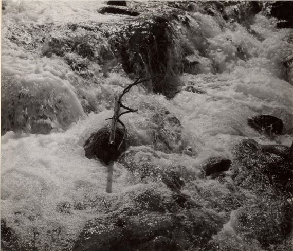A black and white photo of a piece of paper with writing on it.
