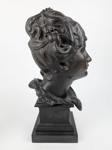 Artwork by Désiré Ringel d'Illzach, Bust of a lady with a pearled hairstyle, Made of Bronze