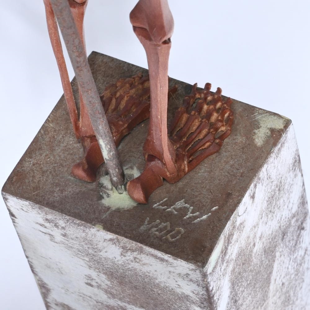 Artwork by Willy Vandekerckhove, sculpture of a wooden two-headed skeleton under a glass dome, Made of Wood