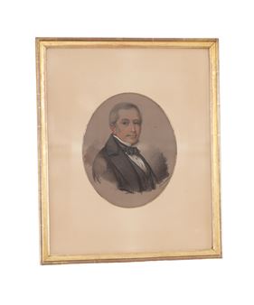 A framed oval portrait of a formally dressed figure against a neutral background.