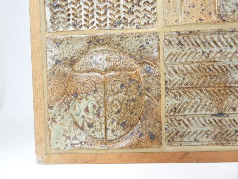 Artwork by André Bodin, Large stoneware wall plaque with 31 tiles decorated with flowers and insects, Made of Stoneware