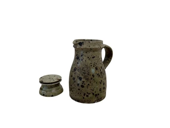 Set consisting of a small circular box and a pitcher in pyrite sandstone by Robert Deblander