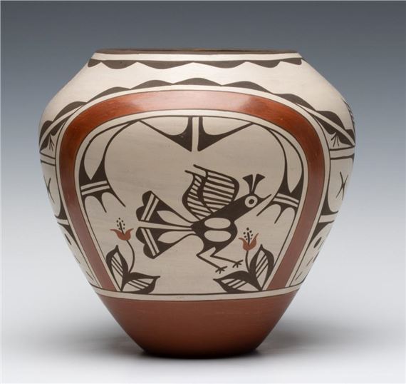 Celebrated Zia Pueblo potter of the Coyote Clan who now resides in Jemez Pueblo. She was taught by her mother, Sofia Pino Bell, and continues a family legacy of potters that includes her grandparents, Joe and Ascension Galvan Pino, and her siblings, - Ruby Panana
