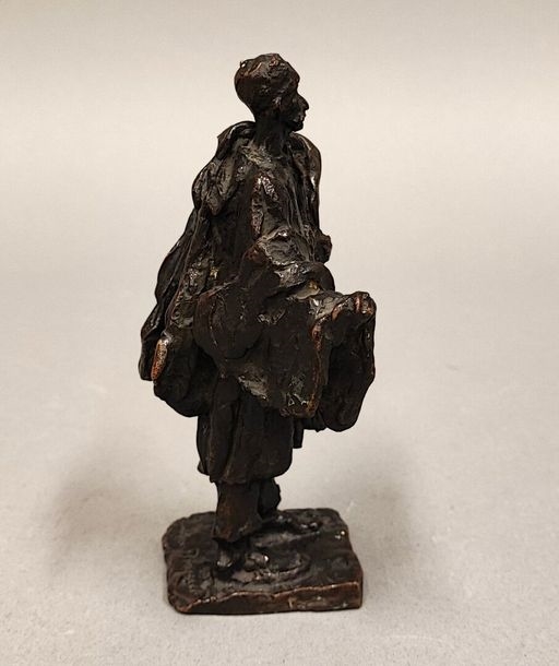 Artwork by Gaston Broquet, Woman with bundles, Made of Bronze