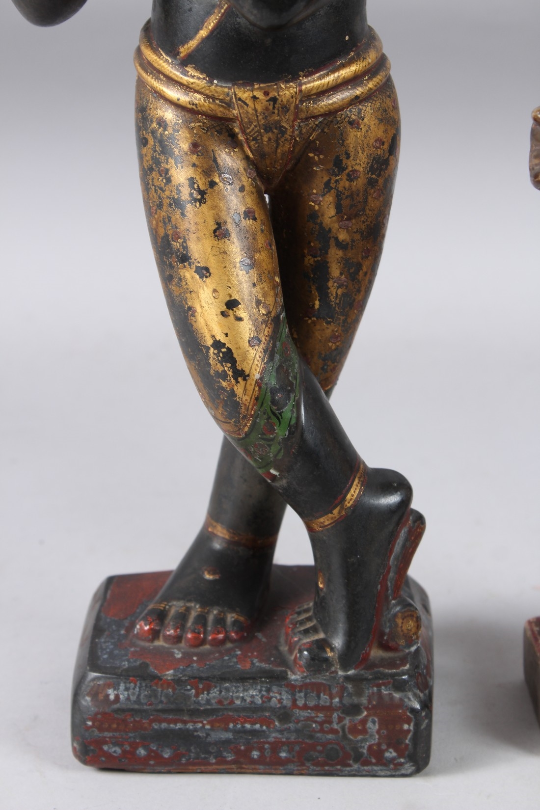 Artwork by Indian School, 19th Century, A LARGE AND FINELY CARVED EARLY 19TH CENTURY INDIAN PAINTED AND GILDED STONE FIGURES OF KRISHNA, Made of Painted And Gilded Stone