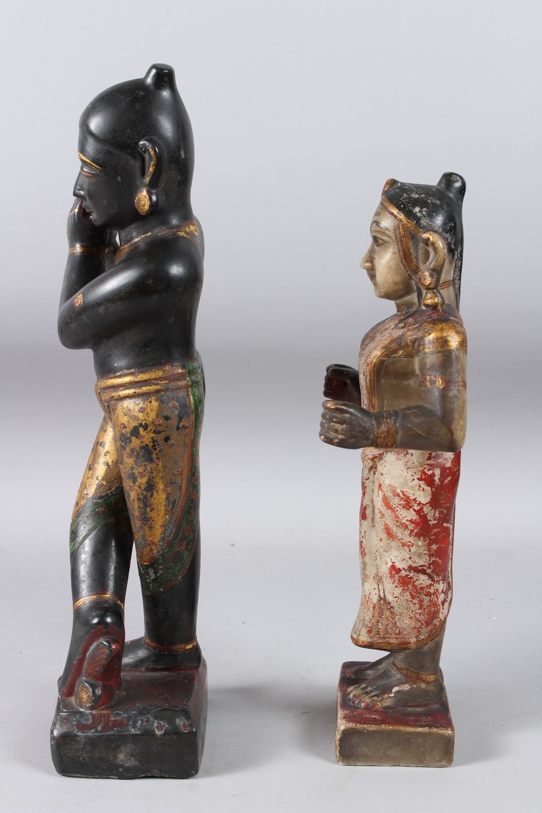 Artwork by Indian School, 19th Century, A LARGE AND FINELY CARVED EARLY 19TH CENTURY INDIAN PAINTED AND GILDED STONE FIGURES OF KRISHNA, Made of Painted And Gilded Stone