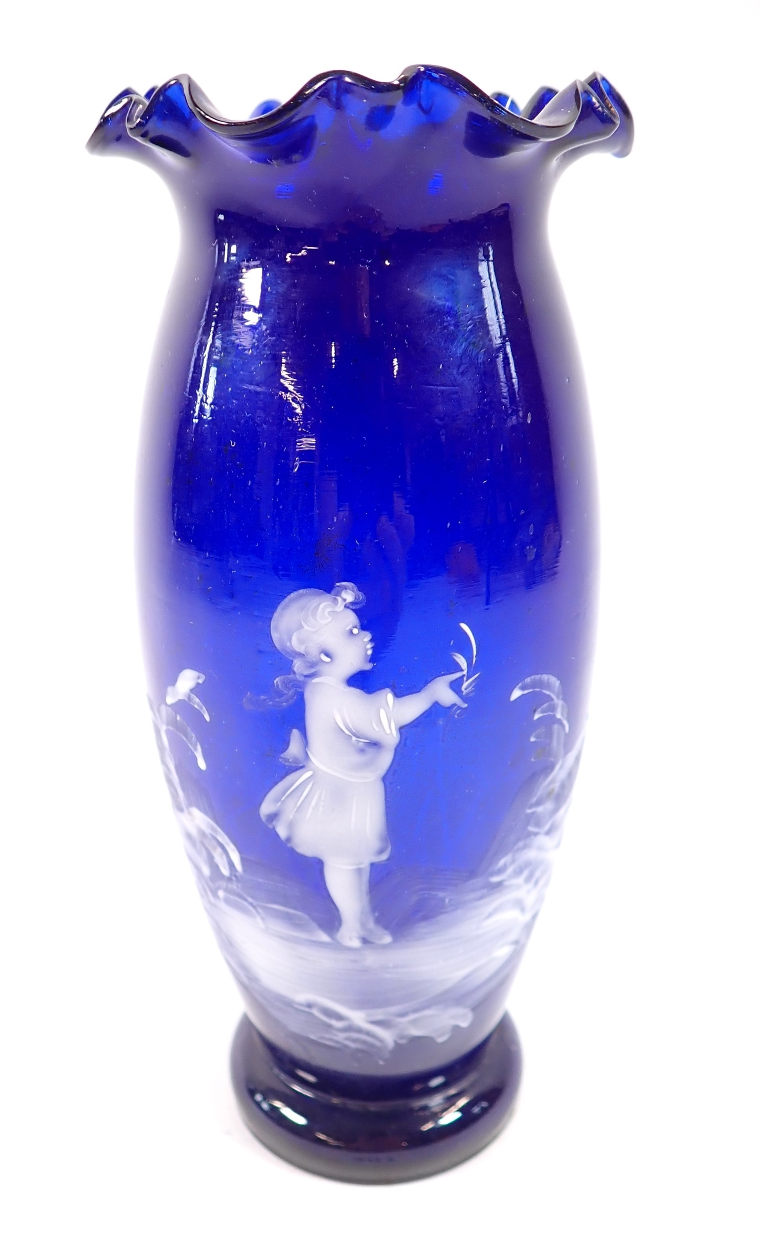 Artwork by Mary Gregory, A Mary Gregory blue glass vase painted child, Made of Blue Glass