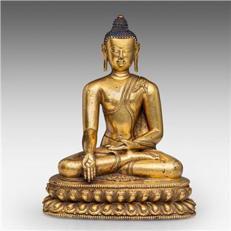A large Tibeto-Chinese gilt bronze figure of Baisajyaguru (Medicine Buddha - Tibeto-Chinese School, 15th Century
