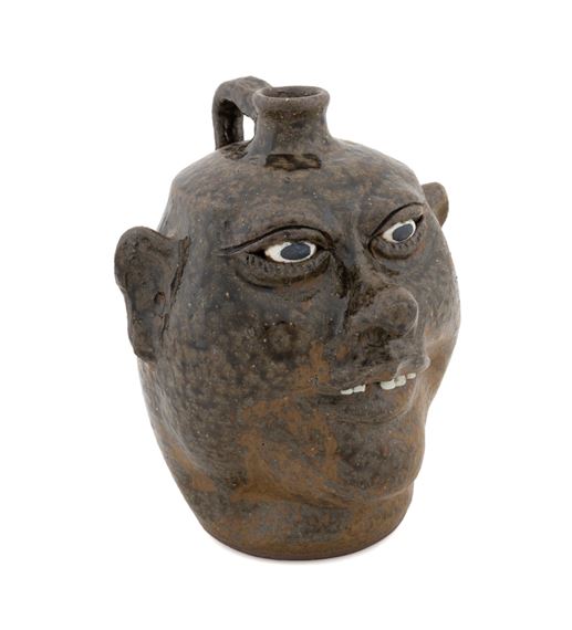 Stoneware gap tooth face jug by Lanier Meaders, 1917-1998