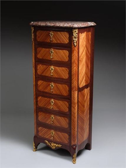 Semainier in rosewood and amaranth veneer with rounded jambs framing seven drawers decorated with curved reserves - Andre Antoine Lardin