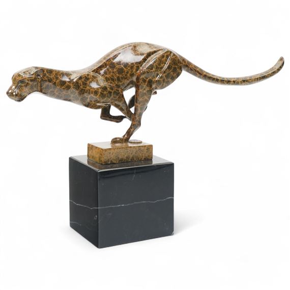 Bronze two toned figure of running cheetah