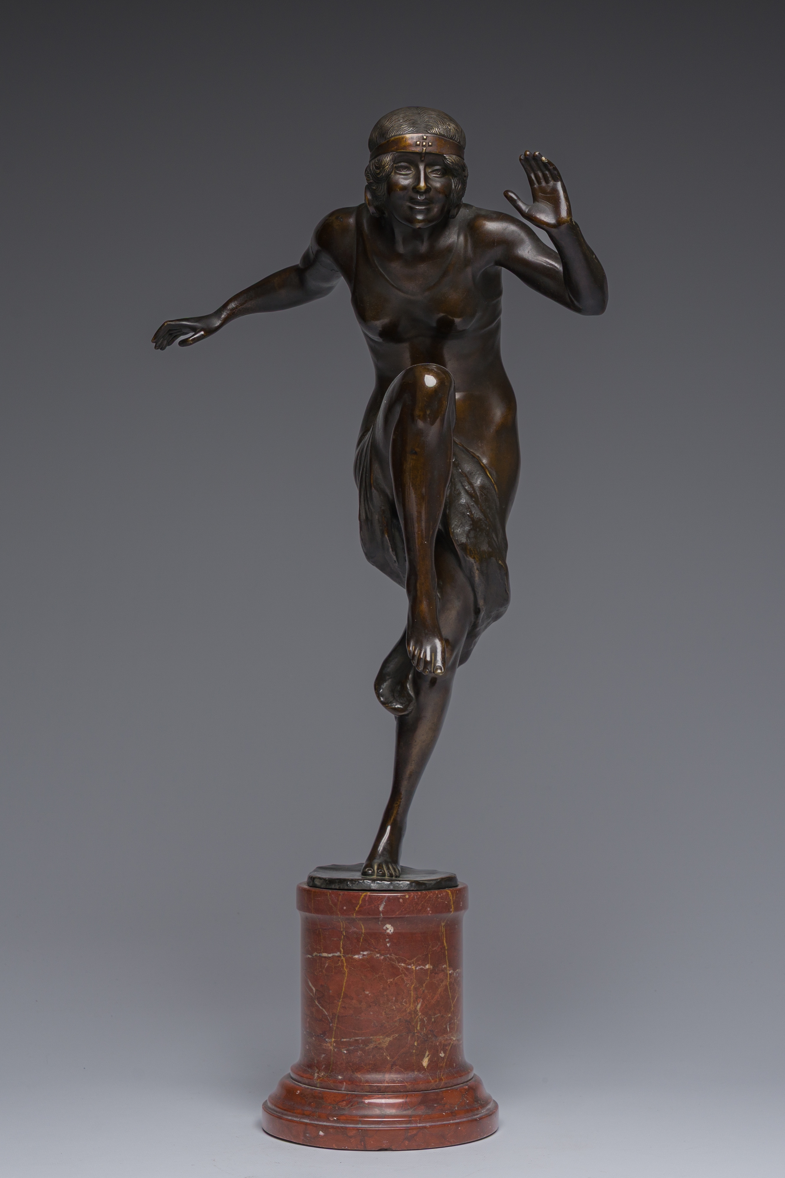 Artwork by Rudolf Marcuse, Dancer, Made of patinated bronze on a red marble base