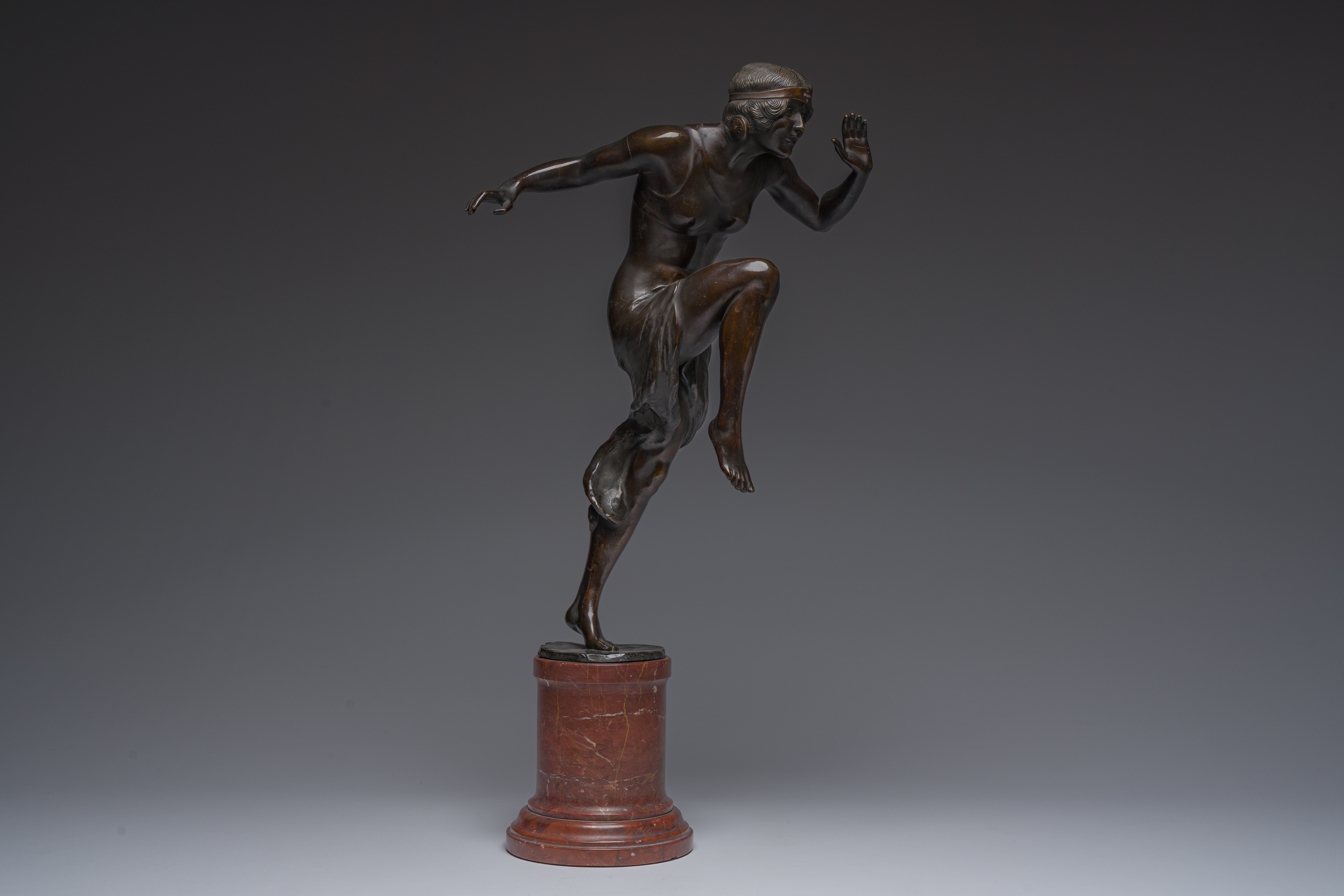 Artwork by Rudolf Marcuse, Dancer, Made of patinated bronze on a red marble base