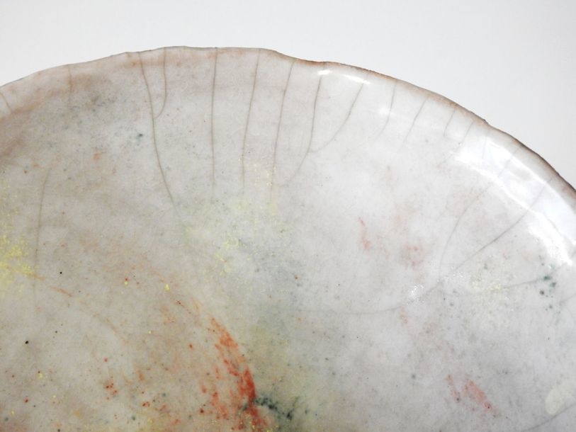 Artwork by Gisèle Buthod-Garçon, Raku bowl and frame, multicolored interior on white background, Made of Raku