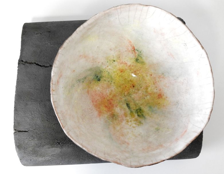 Artwork by Gisèle Buthod-Garçon, Raku bowl and frame, multicolored interior on white background, Made of Raku