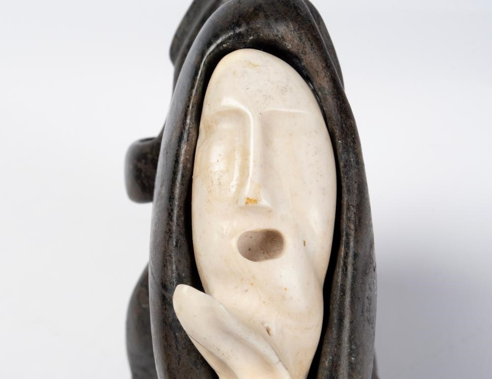 Artwork by Alex Alikashuak, Faces, Made of Stone And Bone