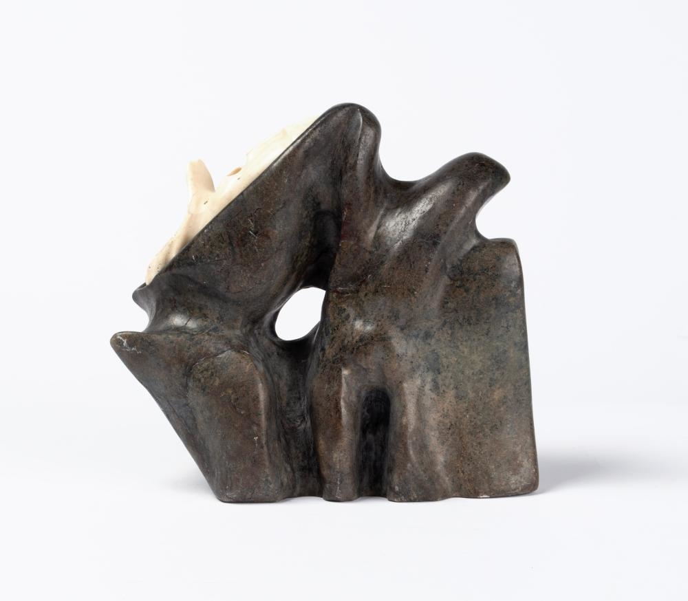 Artwork by Alex Alikashuak, Faces, Made of Stone And Bone