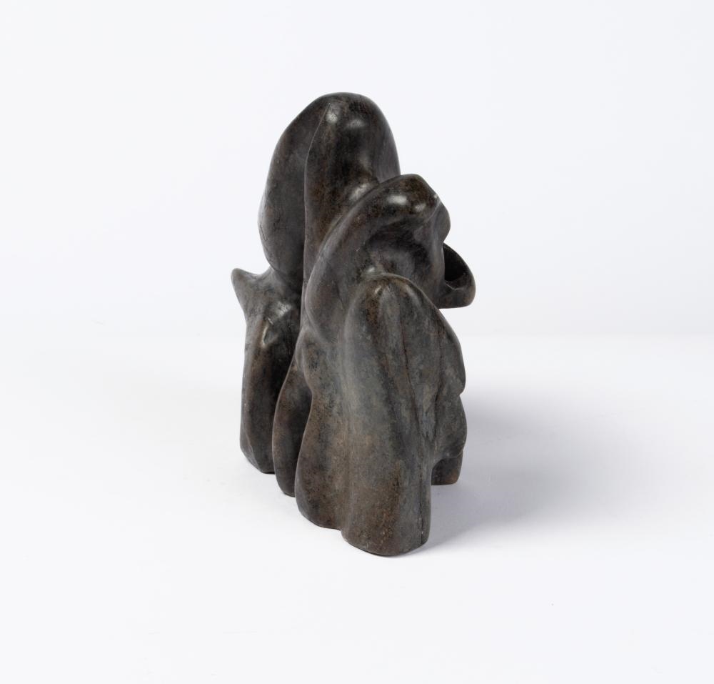 Artwork by Alex Alikashuak, Faces, Made of Stone And Bone