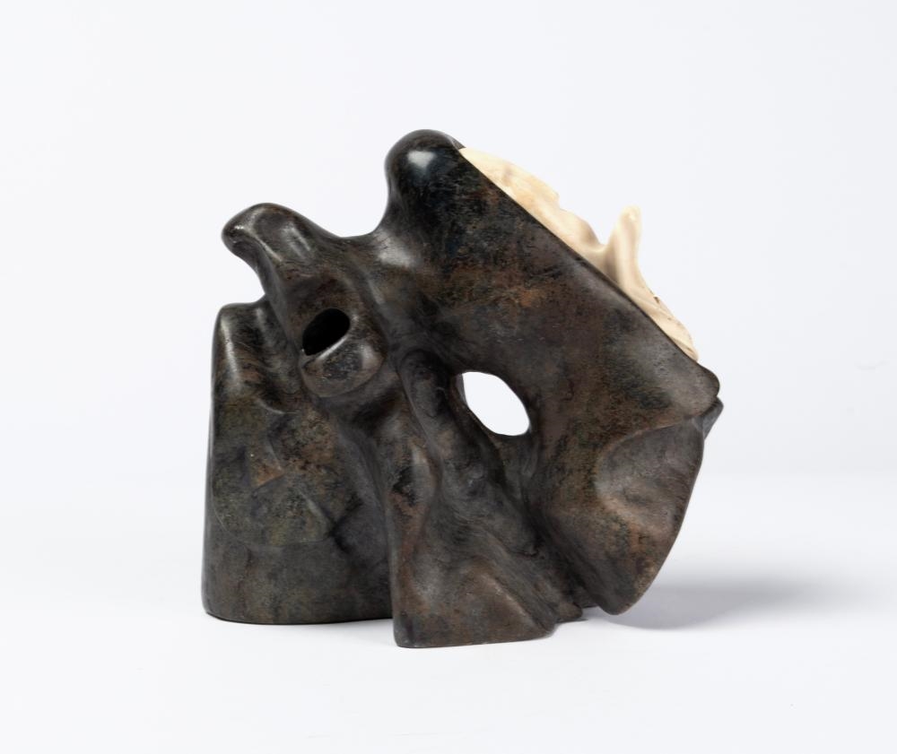 Artwork by Alex Alikashuak, Faces, Made of Stone And Bone