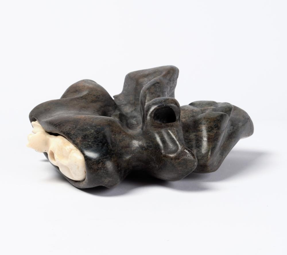 Artwork by Alex Alikashuak, Faces, Made of Stone And Bone