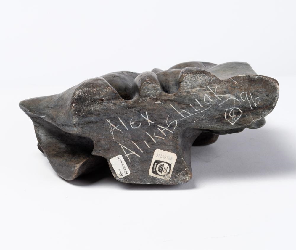 Artwork by Alex Alikashuak, Faces, Made of Stone And Bone