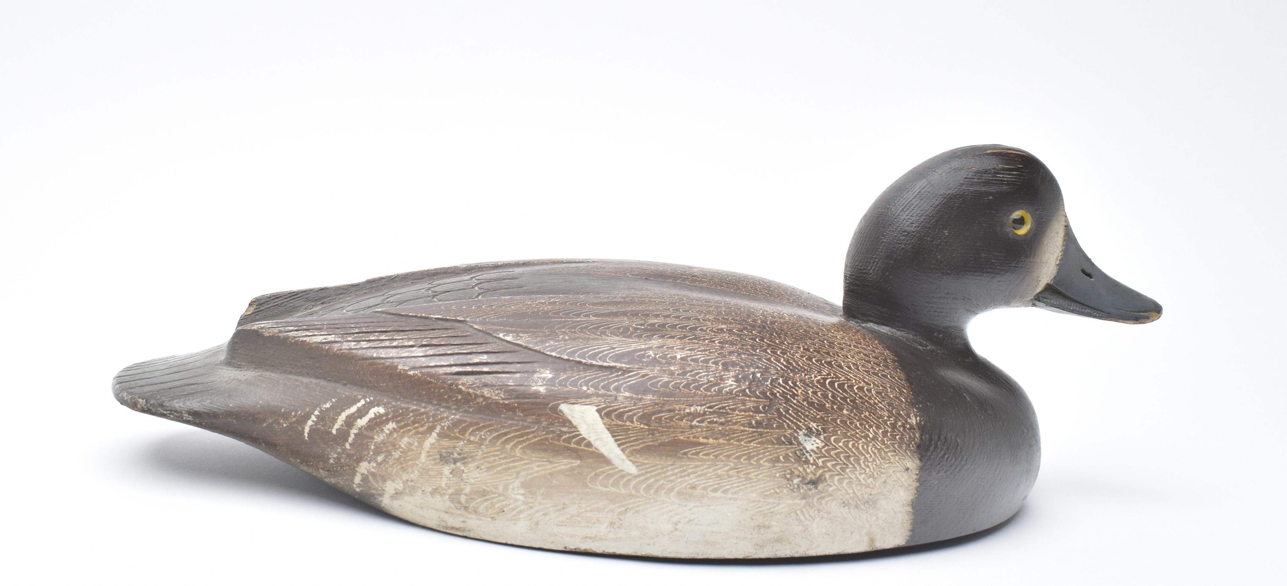 Artwork by David W. Nichol, Bluebill hen, Made of split wingtip carving and some detail carving