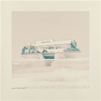 A minimalist architectural photograph of a modern house floating above a frozen lake.