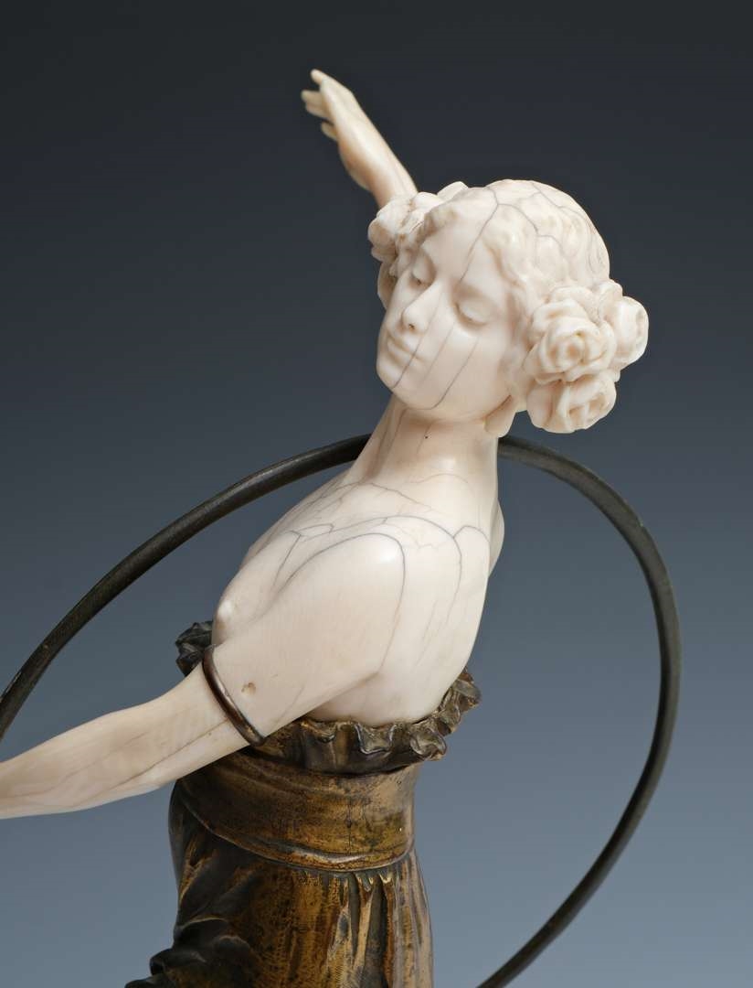 Artwork by Charles Arthur Muller, Charles Arthur Muller (1868-ca. 1930), een brons en ivoren art nouveau sculptuur van een dansende dame met hoepel, Made of bronze