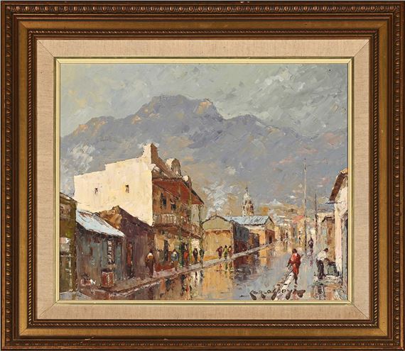 A framed oil painting of a rainy town street scene with mountains in the background.