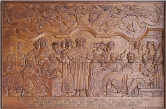 a very large carved oak low relief wall mural, depicting printers through the ages, including William Morris, Eric Gill, and other famous printers - Arthur Henry Cousins (fl.20th Century)