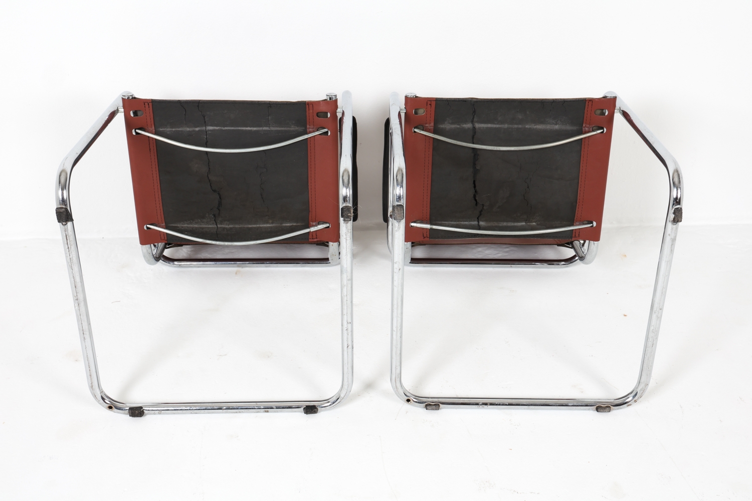 Artwork by Mart Stam, Cantilever dining chairs, Made of Chrome steel with brown leather upholstery