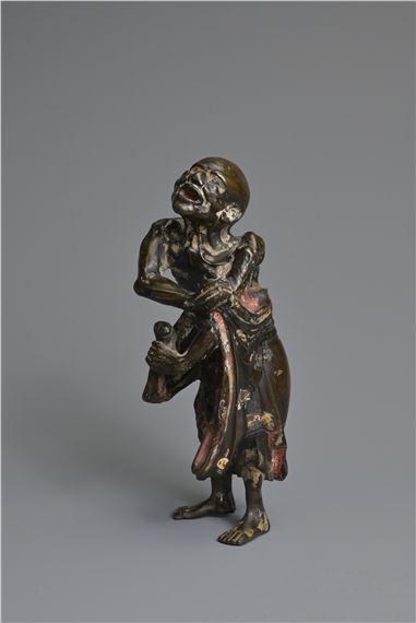 A CHINESE HEAVILY CAST BRONZE MODEL OF A LUOHAN by Chinese School, 17/18th Century