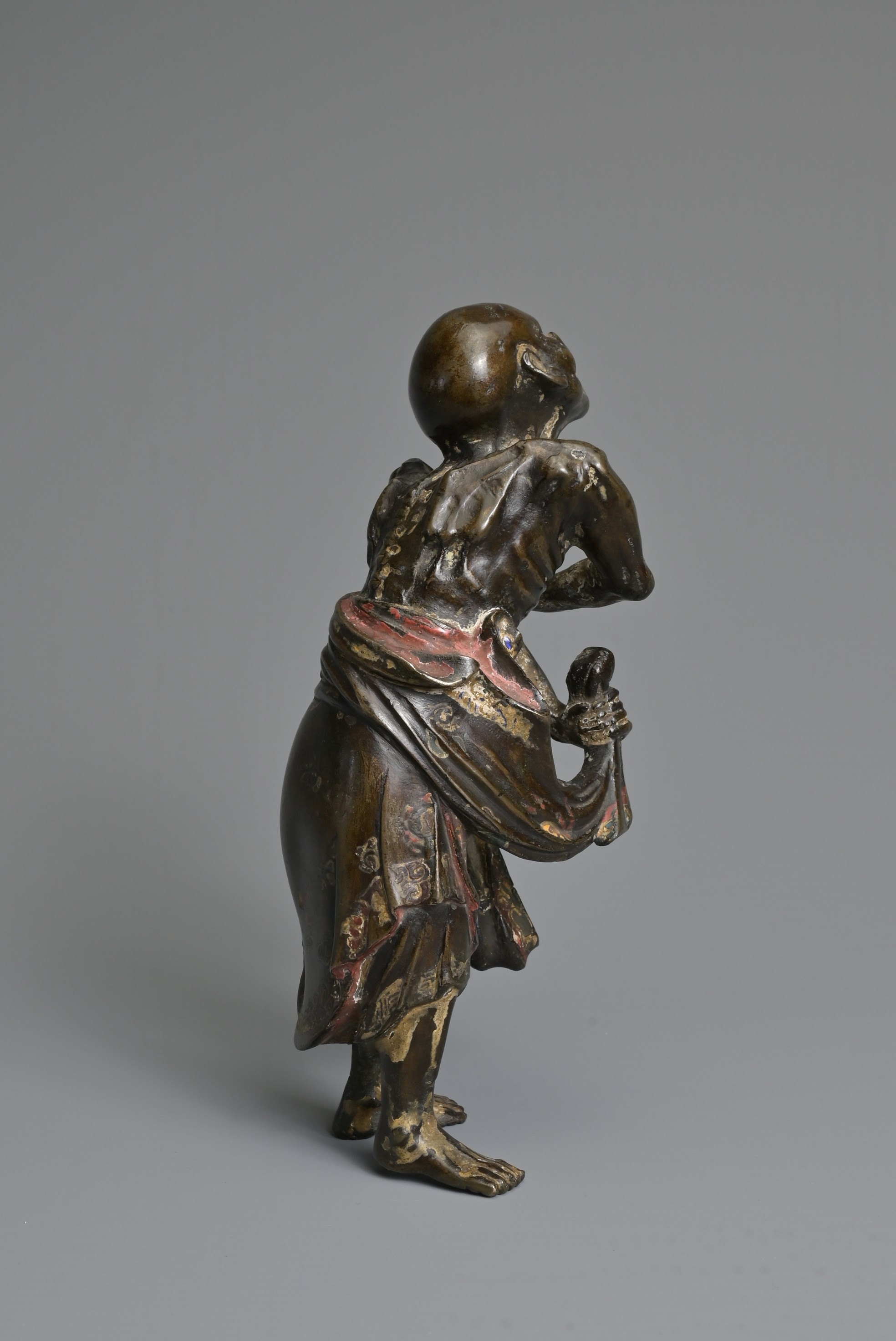 Artwork by Chinese School, A CHINESE HEAVILY CAST BRONZE MODEL OF A LUOHAN, Made of Bronze
