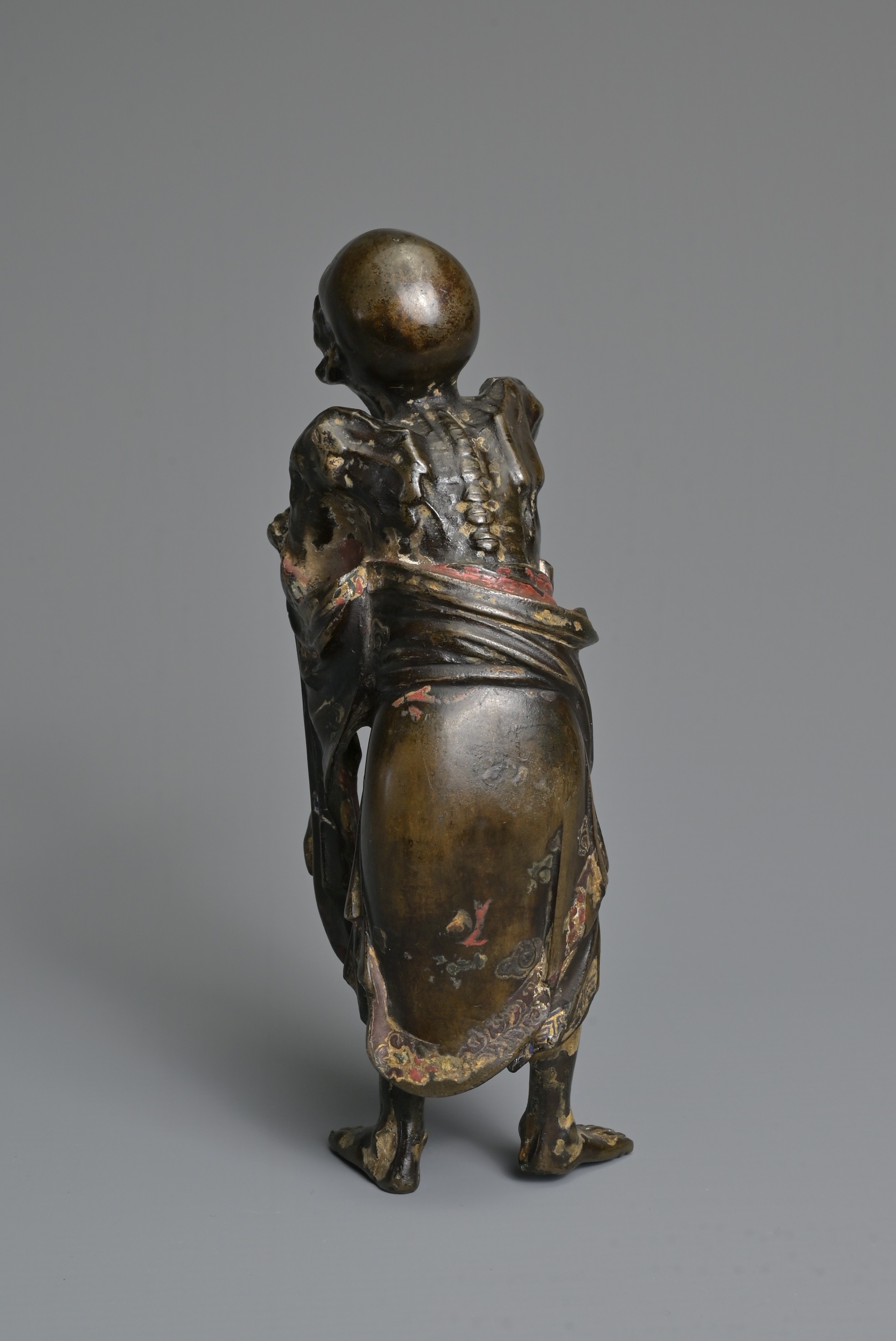 Artwork by Chinese School, A CHINESE HEAVILY CAST BRONZE MODEL OF A LUOHAN, Made of Bronze