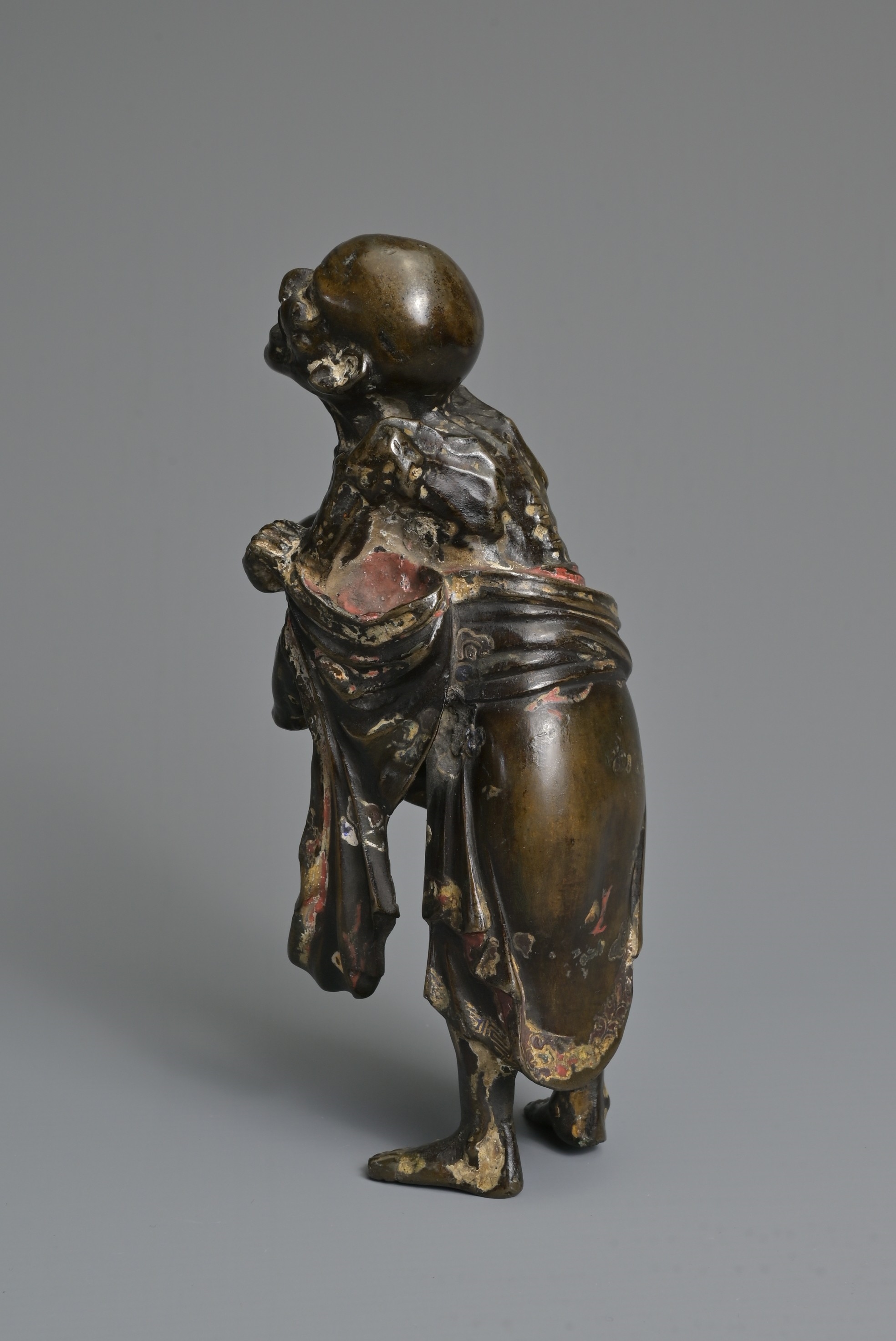 Artwork by Chinese School, A CHINESE HEAVILY CAST BRONZE MODEL OF A LUOHAN, Made of Bronze