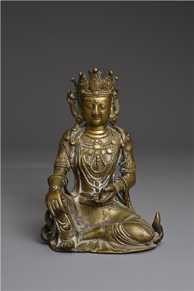 A CHINESE BRONZE FIGURE OF GUANYIN by Chinese School, 17th Century