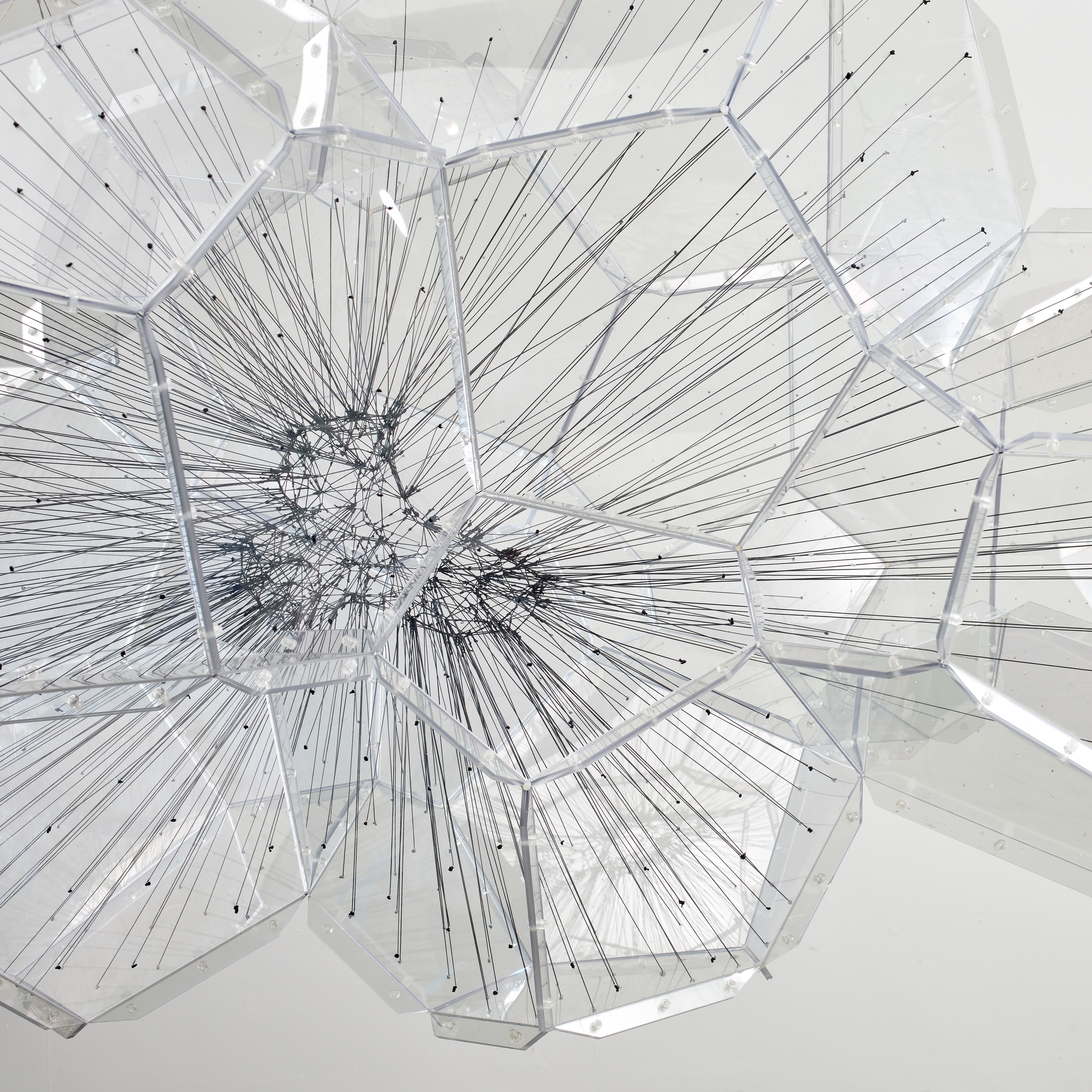 Artwork by Tomas Saraceno, Superstring, Made of Acrylic, elastic rope and metal hardware